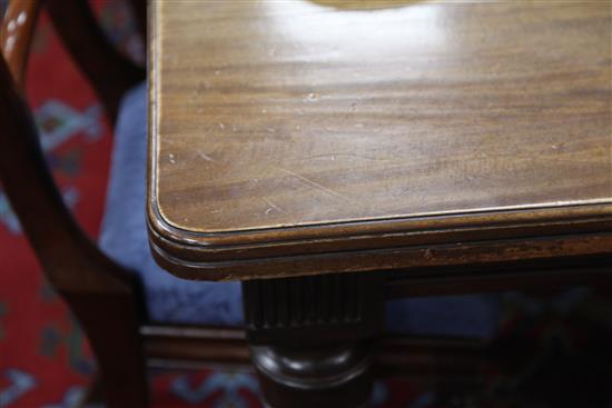 An Edwardian extending dining table extends to 240cm.
